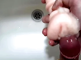 Such serious orgams using a vagina toy  his sink