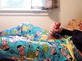 Twink cums through opening to sesame street pijamas